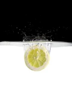 Lemon slice in water Stock Photos