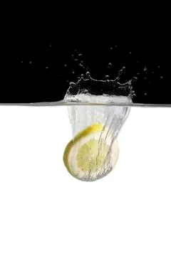 Lemon slice in water Stock Photos
