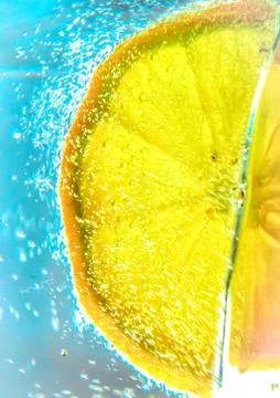 Lemon slice in water Stock Photos
