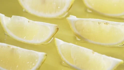 Lemon slices arranged on yellow background. Citrus composition concept. Pabulum. Stock Footage 277111784