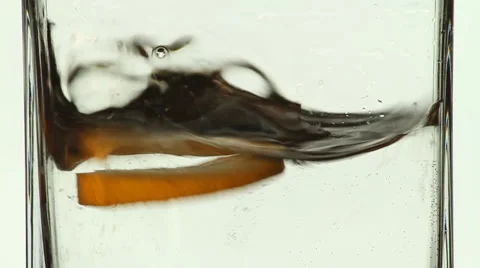 Lemon slices falling in water 2 Stock Footage 49880619