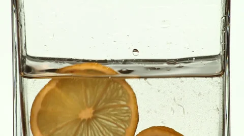 Lemon slices falling in water  Stock Footage 49881244