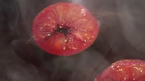 Lemon slices floating in mulled wine, sliced lemons spinning in gluvine, cooking Video stock 76806582