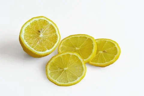 Lemon slices on a light. Stock Photos