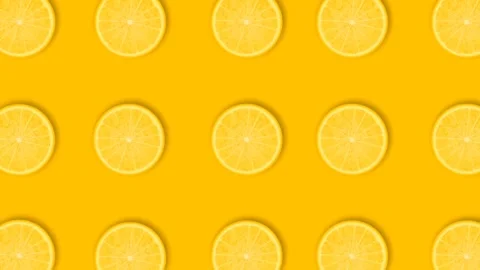 Lemon Slices Pattern Rotating on Yellow Background Loop Stock-Footage 274455105