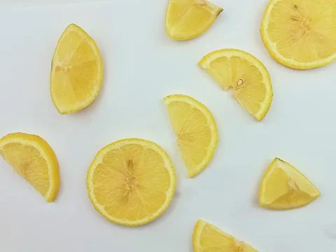 Lemon slices pattern on white background Stock Photos