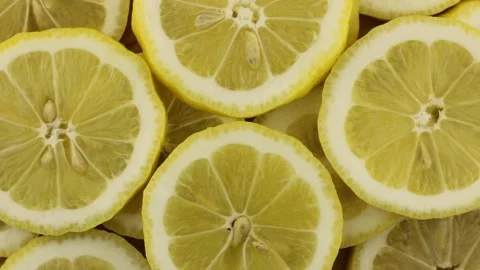 Lemon slices rotate close-up. Top view of vitamin C. 스톡 동영상 152070849