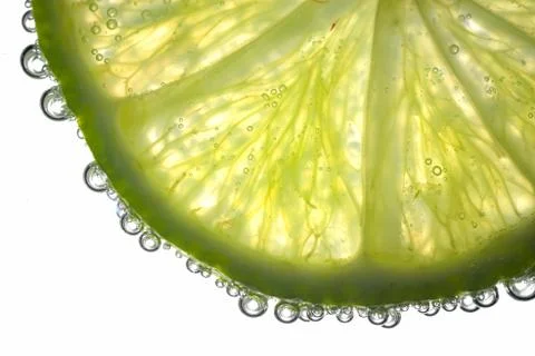 Lemon Slices In Water With Bubbles Stock Photos