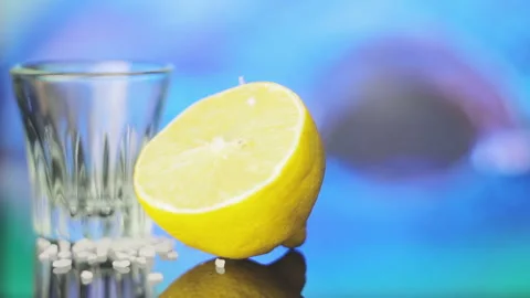 Lemon For A Snack And Empty Glass For Alcohol With Sea Life Background Stock Footage 111671221