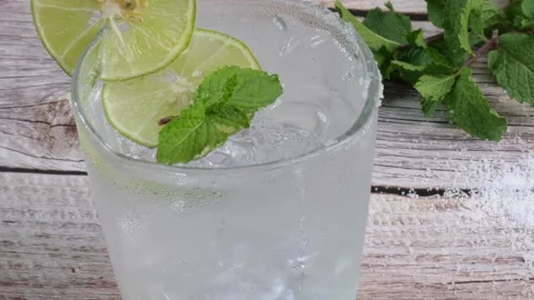 Lemon soda cold drink Lemon juice with soda on ice Garnished with sliced lemo Stock Footage 190817589