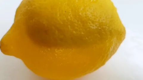 Lemon is spinning, slow-motion shooting Stock Footage 89815688