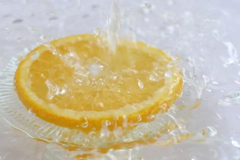 Lemon splash in water Stock Photos