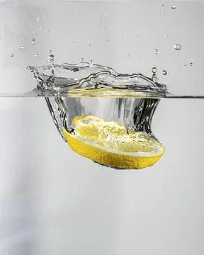 Lemon splash in water Stock Photos