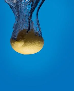Lemon splashing Stock Photos