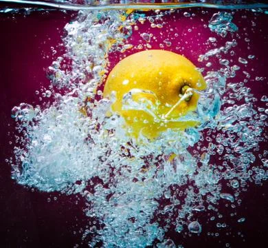 Lemon Splashing on the Watter Stock Photos