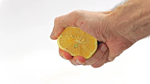 Lemon squeezing - White Background - Slow Motion Stock Footage 122922907