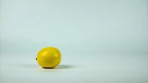Lemon, tangerine, grapefruit replace each other. Stop motion Stock Footage 146208181