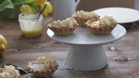 Lemon tarts on a white stand Stock Footage 148274450