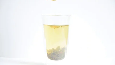 Lemon into tea Stock Footage 129767720