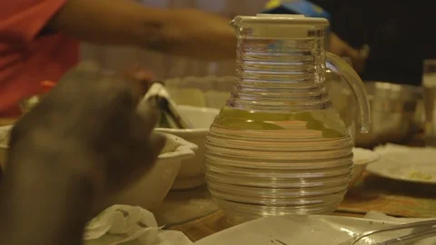 Lemon Water at the Dinner Table Stock Footage 115861914