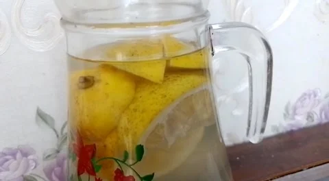 Lemon water in the jar Stock Footage 219986836