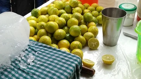 Lemon Water making with Ice Stock Footage 127105951