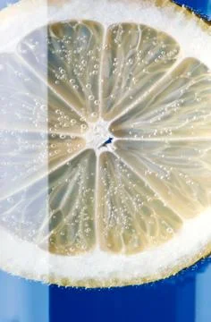 Lemon in water Stock Photos