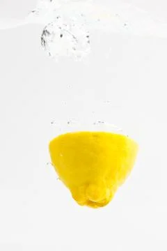 Lemon with water splash Stock Photos