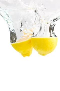 Lemon with water splash Stock Photos