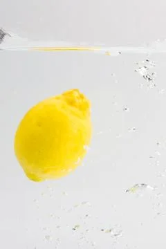 Lemon with water splash Stock Photos
