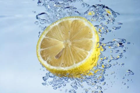 Lemon with water splash Stock Photos