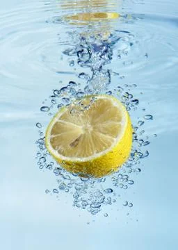 Lemon with water splash Stock Photos