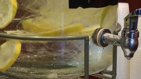 Lemon Water Tap Close Up Video stock 78518388