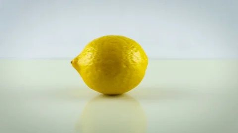 Lemon on a white background Stock Footage 74657165