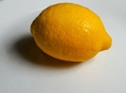 Lemon whole single macro Stock Photos