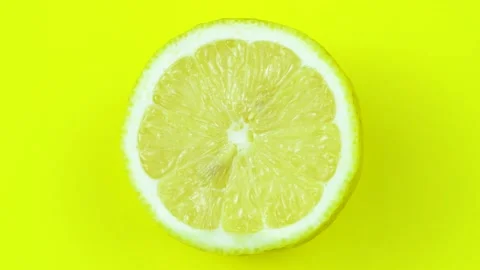 Lemon on a yellow background Stock Footage 150126323