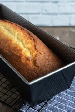 Lemon yogurt cake on rustic background Stock Photos