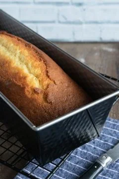 Lemon yogurt cake on rustic background Stock Photos
