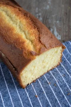 Lemon yogurt cake on rustic background Stock Photos