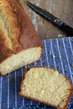 Lemon yogurt cake on rustic background Stock Photos