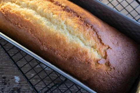 Lemon yogurt cake on rustic background Foto stock