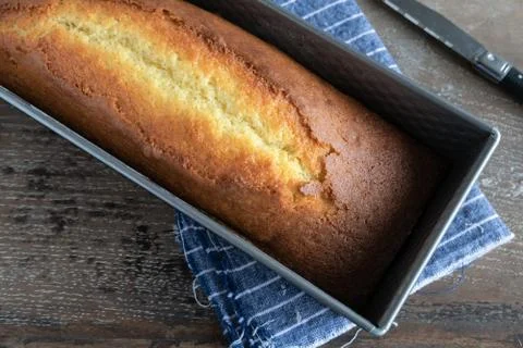 Lemon yogurt cake on rustic background Stock Photos