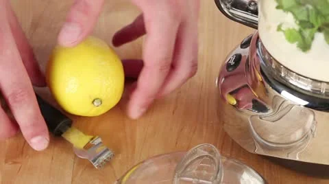 Lemon zest being grated Stock Footage 24671532