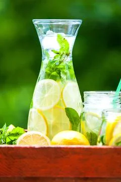 Lemonad jars with mint and ice Stock Photos