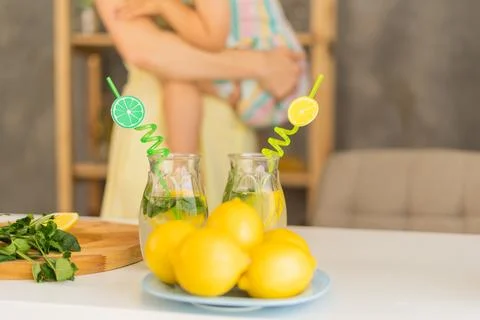 Lemonade on the background of a jug of lemonade Foto stock