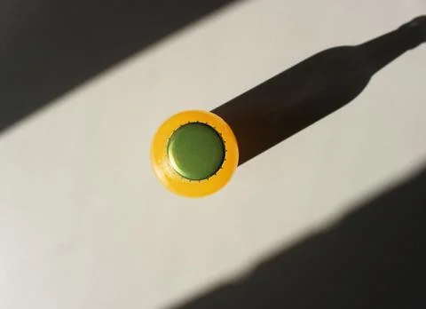 Lemonade Bottle and a Shadow on table view from above.  Stock Photos