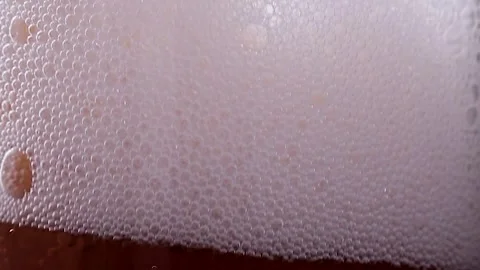 Lemonade bubbles in a glass glass, Stock Footage 258052107