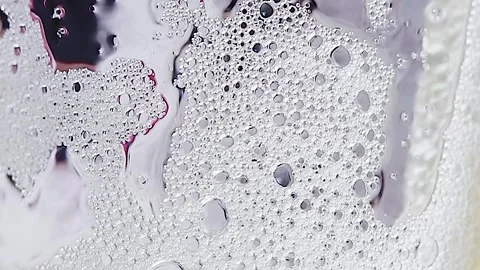 Lemonade bubbles in a glass glass, Stock Footage 258052125