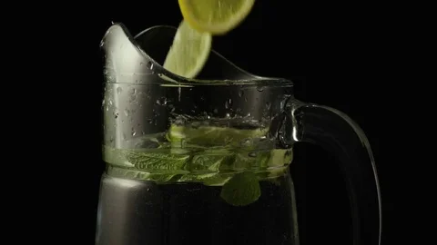Lemonade in carafe super slow mo Stock Footage 72622618