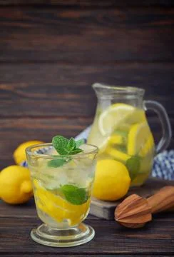 Lemonade with fresh lemon Stock Photos